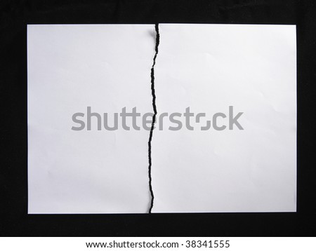 torn or tearing paper into two pieces Royalty-Free Stock Photo #38341555