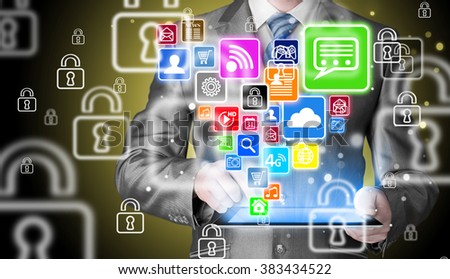 Business man using tablet PC with icon set