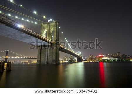 Beautiful view of Brooklyn Bridge by night.