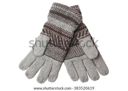 Warm woolen knitted gloves isolated on white background
