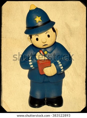 Vintage Toy Policeman in Frame