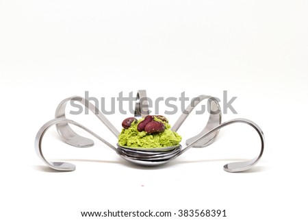 steamed red beans with green tea ice cream on arch spoon Royalty-Free Stock Photo #383568391