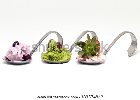 big fresh strawberry and icecream on arch spoon red beans with greentea on spoon and bulberry icecream on spoon on white background Royalty-Free Stock Photo #383574862