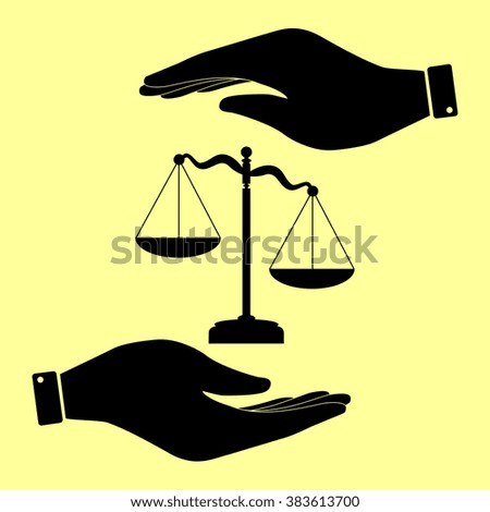 Scales of Justice sign. Save or protect symbol by hands.