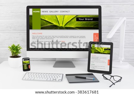 Designer's desk with responsive web ux design user experience concept.  Royalty-Free Stock Photo #383617681