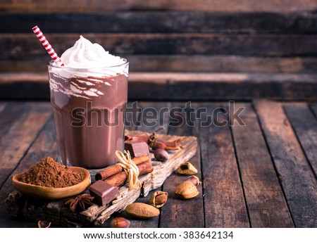 Chocolate milkshake with whipped cream Royalty-Free Stock Photo #383642134