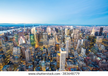Aerial New York City skyline urban skyscrapers at dusk, USA.