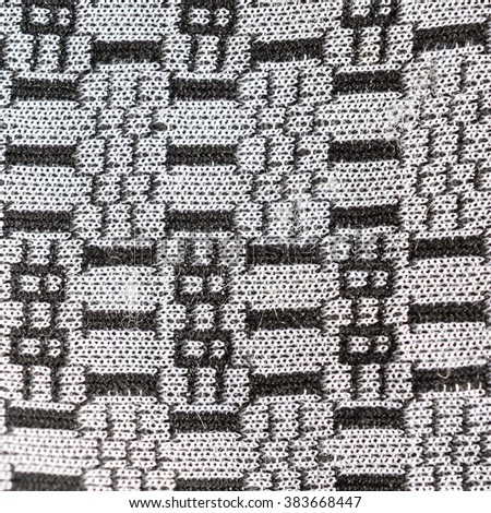 Texture of textile with ornaments, black and gray color