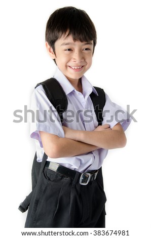 Little student boy in uniform on white background
