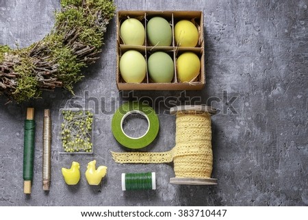 Florists workplace: eggs and accessories to make easter decorations. Top view.