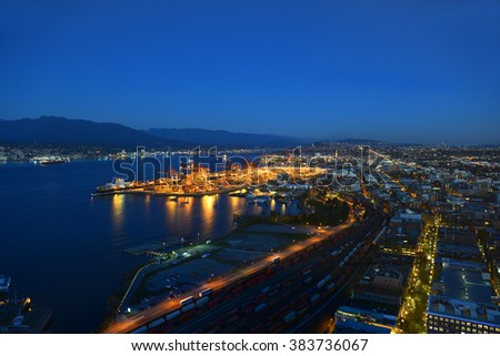 Port of Vancouver district at night, photo taken from the Harbour Centre tower, Vancouver, British Columbia, Canada.