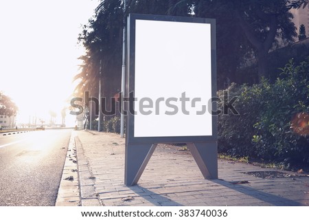 Photo empty lightbox on the bus stop. Horizontal mockup, sunlight