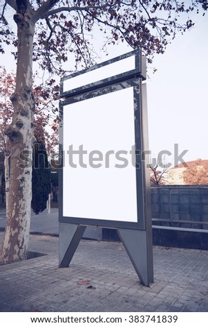 Photo blank lightbox on the bus stop. Vertical mockup
