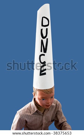 Boy mannequin wearing dunce cap against blue background