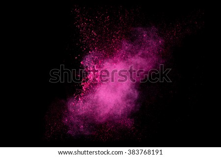 Closeup of a colorful dust particle explosion isolated on black. Abstract background. Color explosion