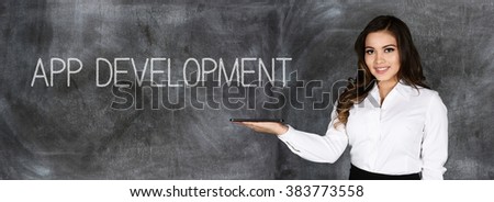 Woman who is doing app development for a tablet