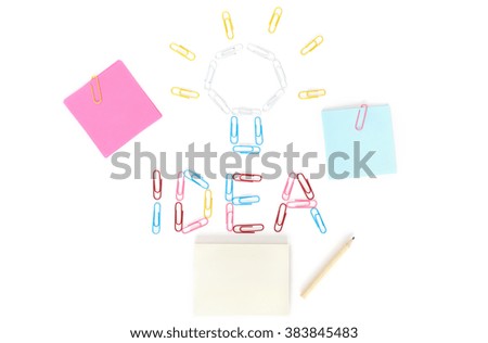 stickers, paper clip, pencil on white background