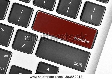 The computer keyboard button written word transfer
