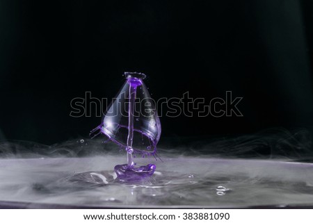 water drop collision on a background wet