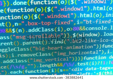 Developer working on program codes in office. Software source code. Writing program code on computer. Website development. (Code is my own property there is no risk of copyright violations)