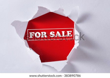Torn Paper with Word "FOR SALE"