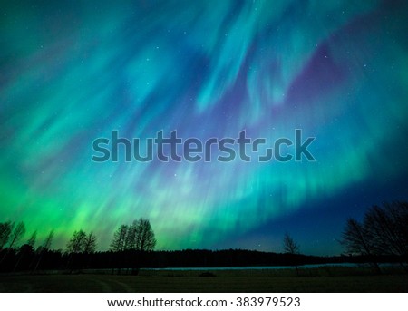 Northern lights aurora borealis landscape Royalty-Free Stock Photo #383979523