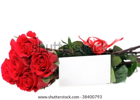 beautiful red roses with name card isolated on white