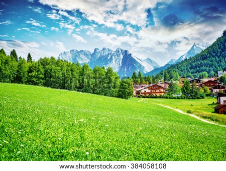 Beautiful view on little mountainous village, Seefeld in Tirol is an old farming village, major tourist resort in Innsbruck-Land District in Austria, Europe
 Royalty-Free Stock Photo #384058108