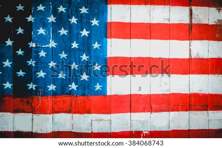 USA, American flag painted on old wood plank background.