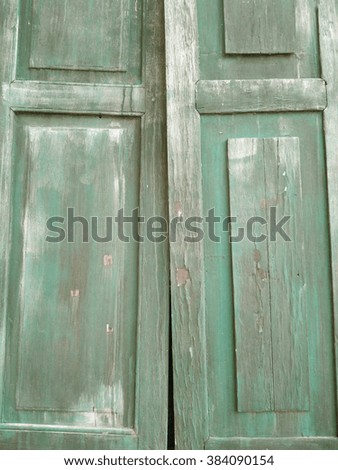 old, moldy green wood window