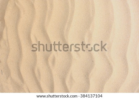 Sand Texture. Brown sand. Background from fine sand. Sand background
