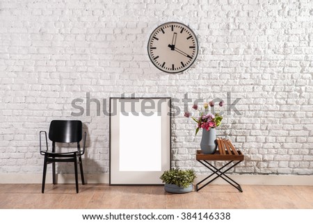 brick wall frame and black chair office wall decor