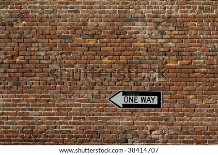 Brick Wall With One-Way Sign