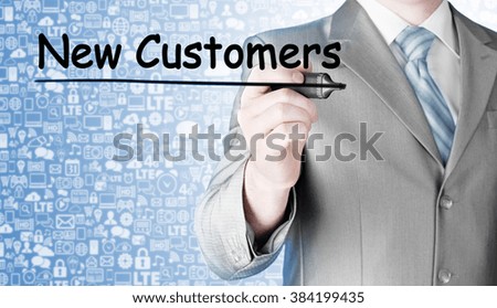 businessman writing new customers
