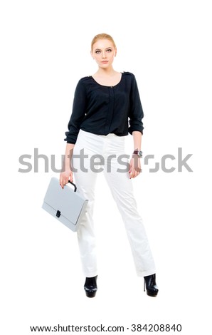 Business woman with folder in her hand. Full length photo.