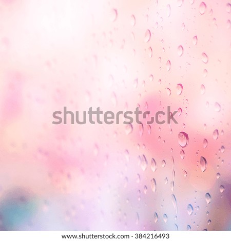 Abstract blur raindrop background in pink tone