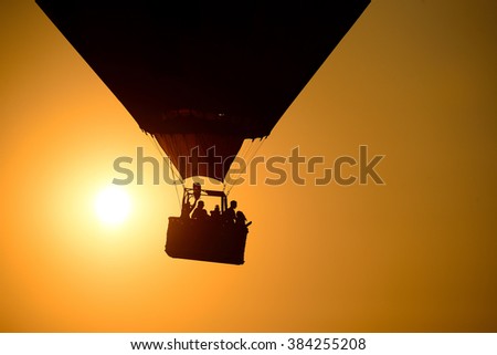Balloon at sunset Royalty-Free Stock Photo #384255208