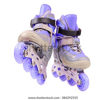 Blue children's rollerskates isolated on white background
