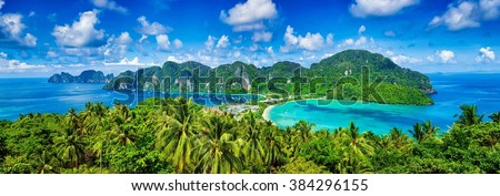 Panorama of tropical islands Phi Phi Don and Phi Phi Leh in sea. Crabi, Thailand Royalty-Free Stock Photo #384296155