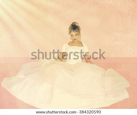 Young teen girl sitting with flowing gown surrounding her against textured background and flooring.  Slight toning and sun beaming down on her for interest.