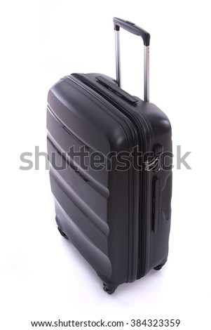 Close up of new black luggage on white background isolated.