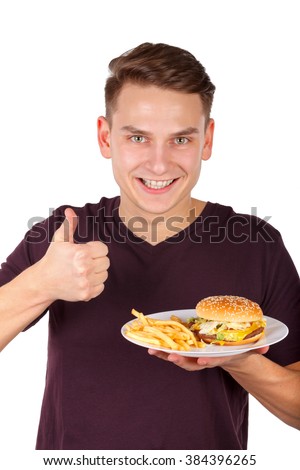 Picture of a man eating a delicious cheeseburger