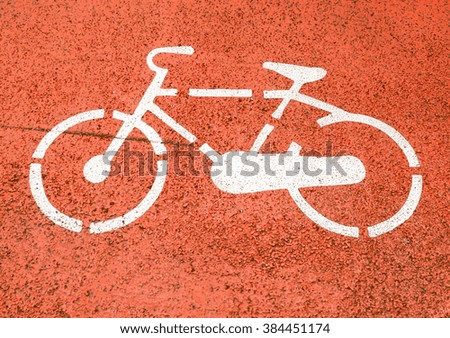  Stencil bike sign on a bicycle lane vintage