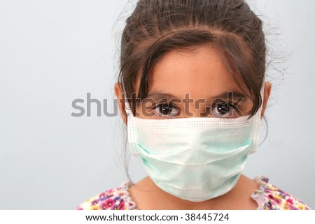 little girl and a mask