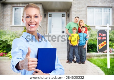 Real Estate agent woman near new house.