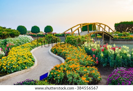 Wood bridge and flower garden.