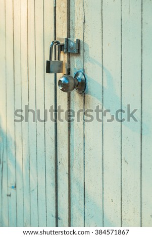 Vintage wooden door with door lock 