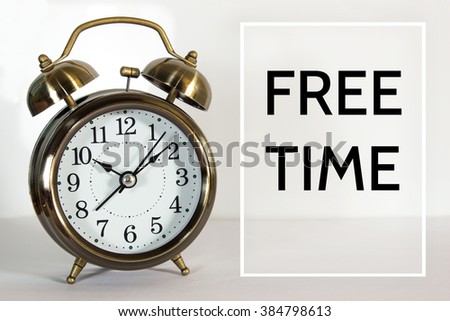 Free time, message on the clock background / Time concept