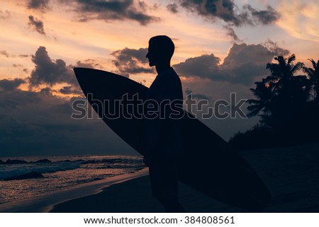 Surfer on the sunset