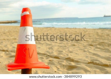 Safety cone in the beach,Majorca,Spain